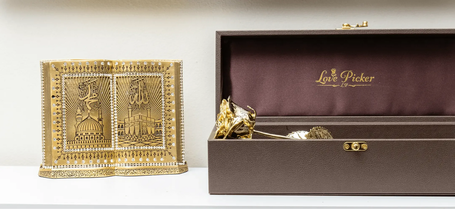 Gold decorative item next to an open box with 'Love Picker' branding on a white background