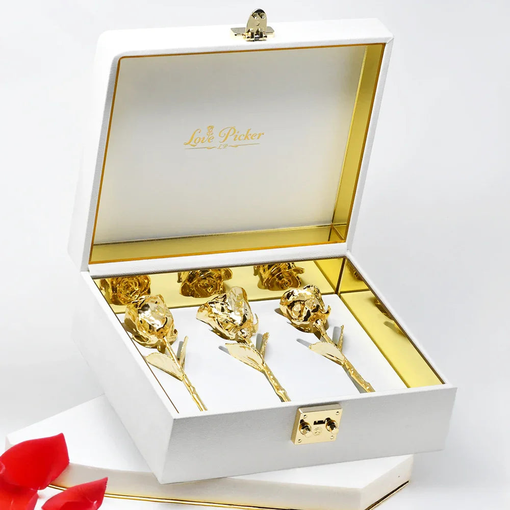A set of real 24K gold-dipped roses elegantly arranged in a white and gold luxury gift box, part of LovePicker’s premium “Gifts for Her” collection.