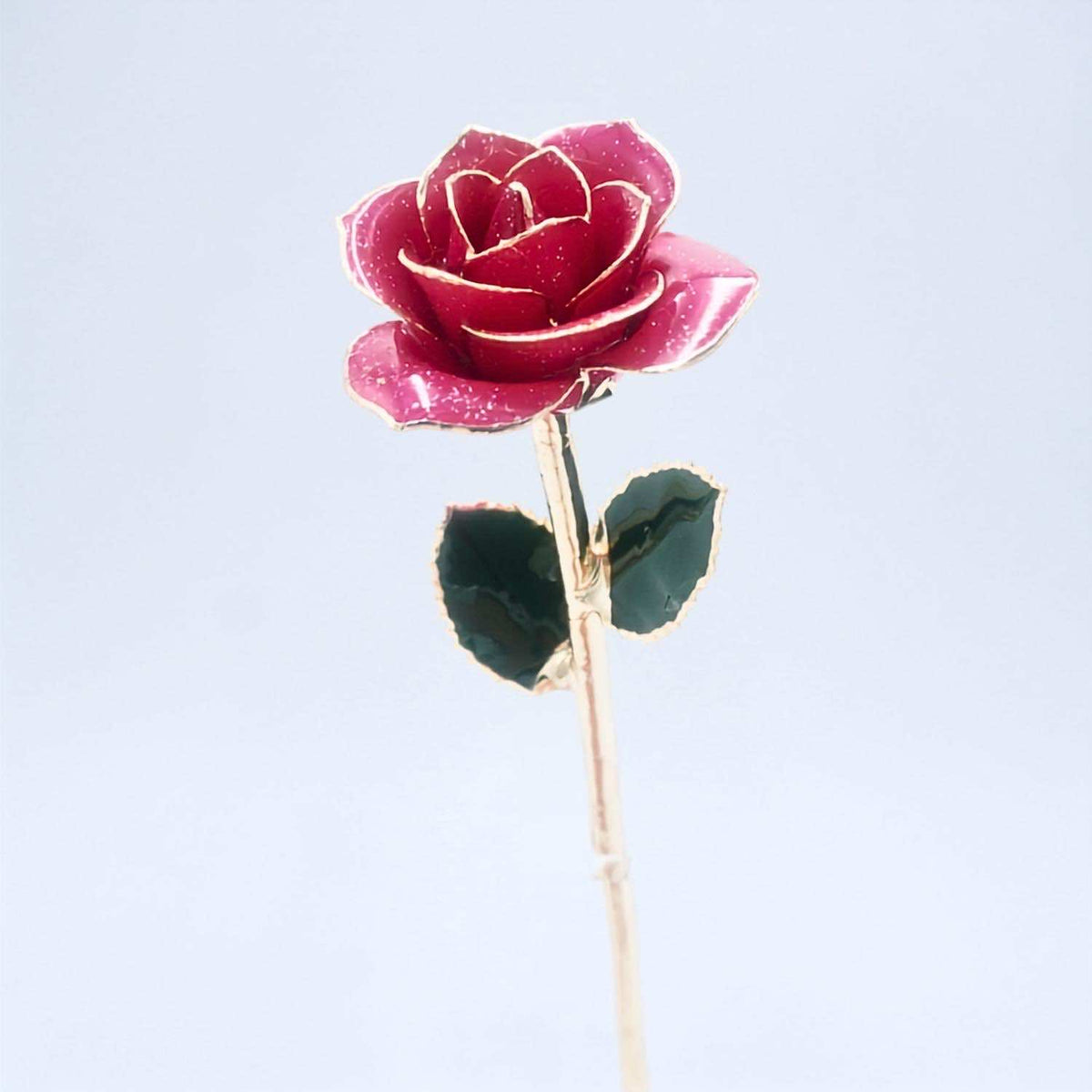Blush pink glitter open bloom rose with 24K gold accents, angled half-length view