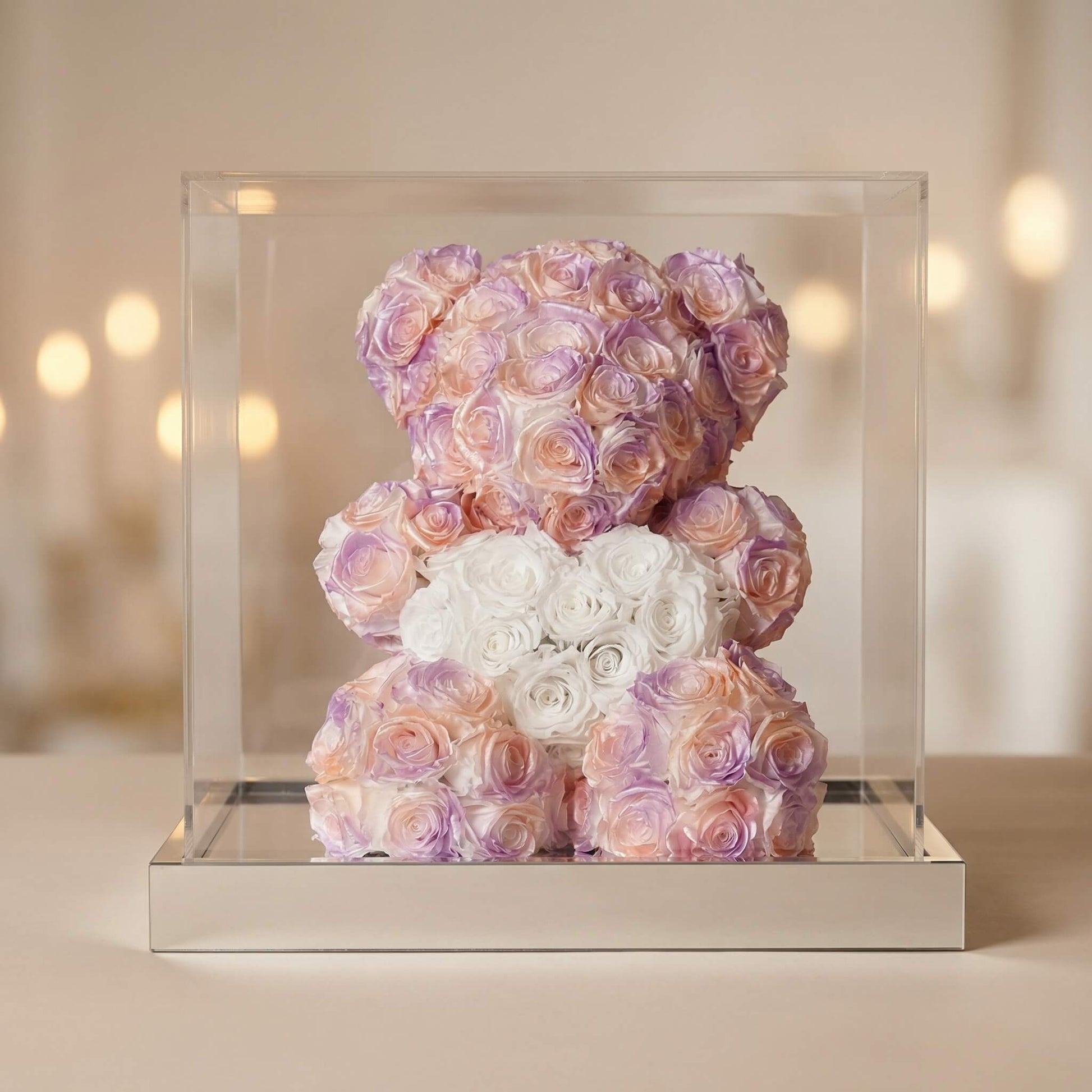 Eternal Rose Teddy Bear in pink and lavender preserved roses in luxury acrylic display case | LovePicker