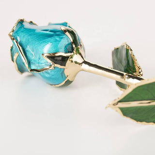 Midnight blue 11.5-inch closed bud preserved rose with 24K gold accents, side view
