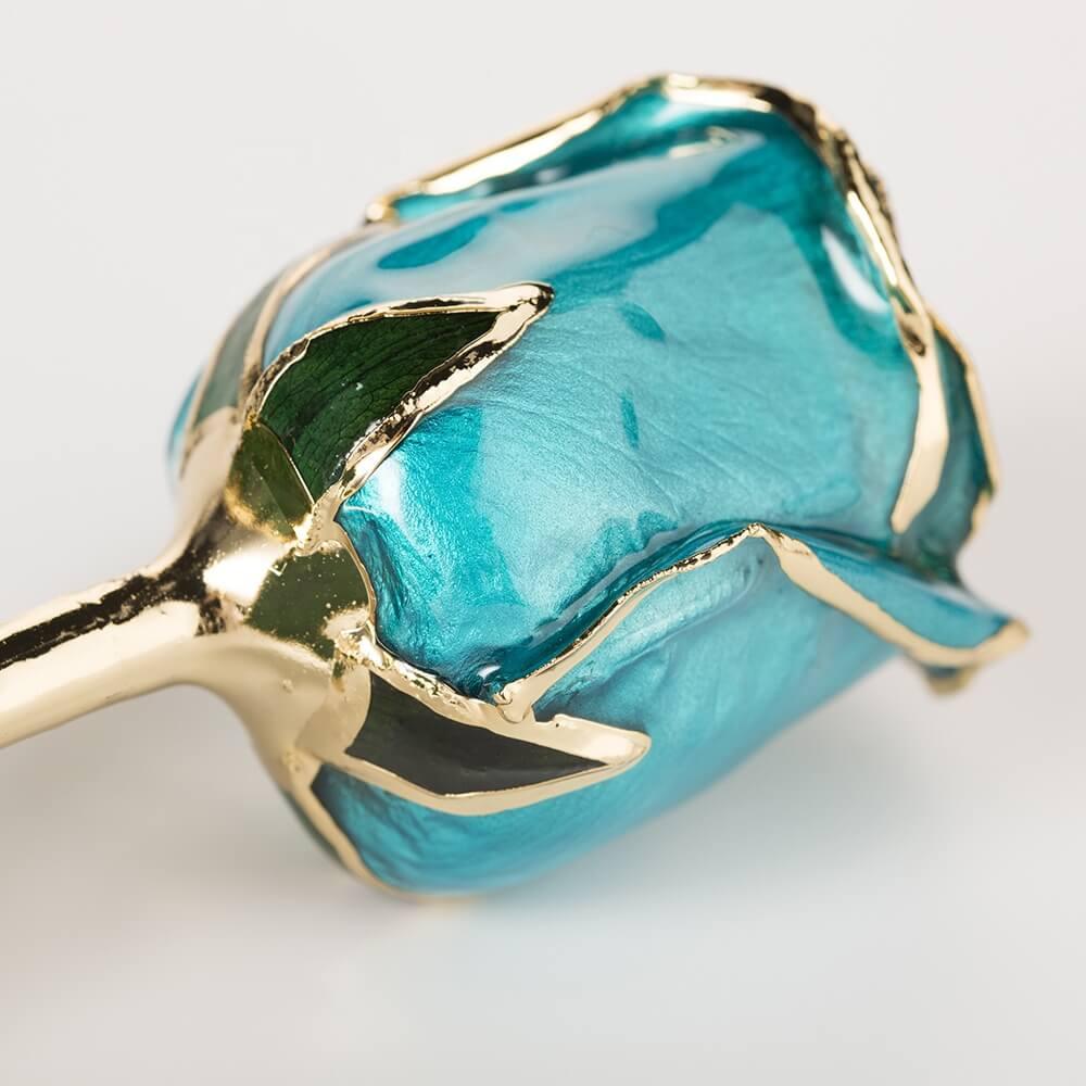 Midnight blue 11.5-inch closed bud preserved rose with 24K gold accents, close-up bloom view