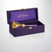 24K gold preserved rose in a purple gift box with gold latch, luxury romantic gift