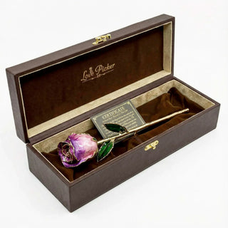 Goald and purple rose in a wooden box with 'Love Picker' branding.