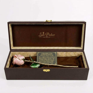 Gold-leafed rose in a decorative box with 'Love Fisher' branding on a white background