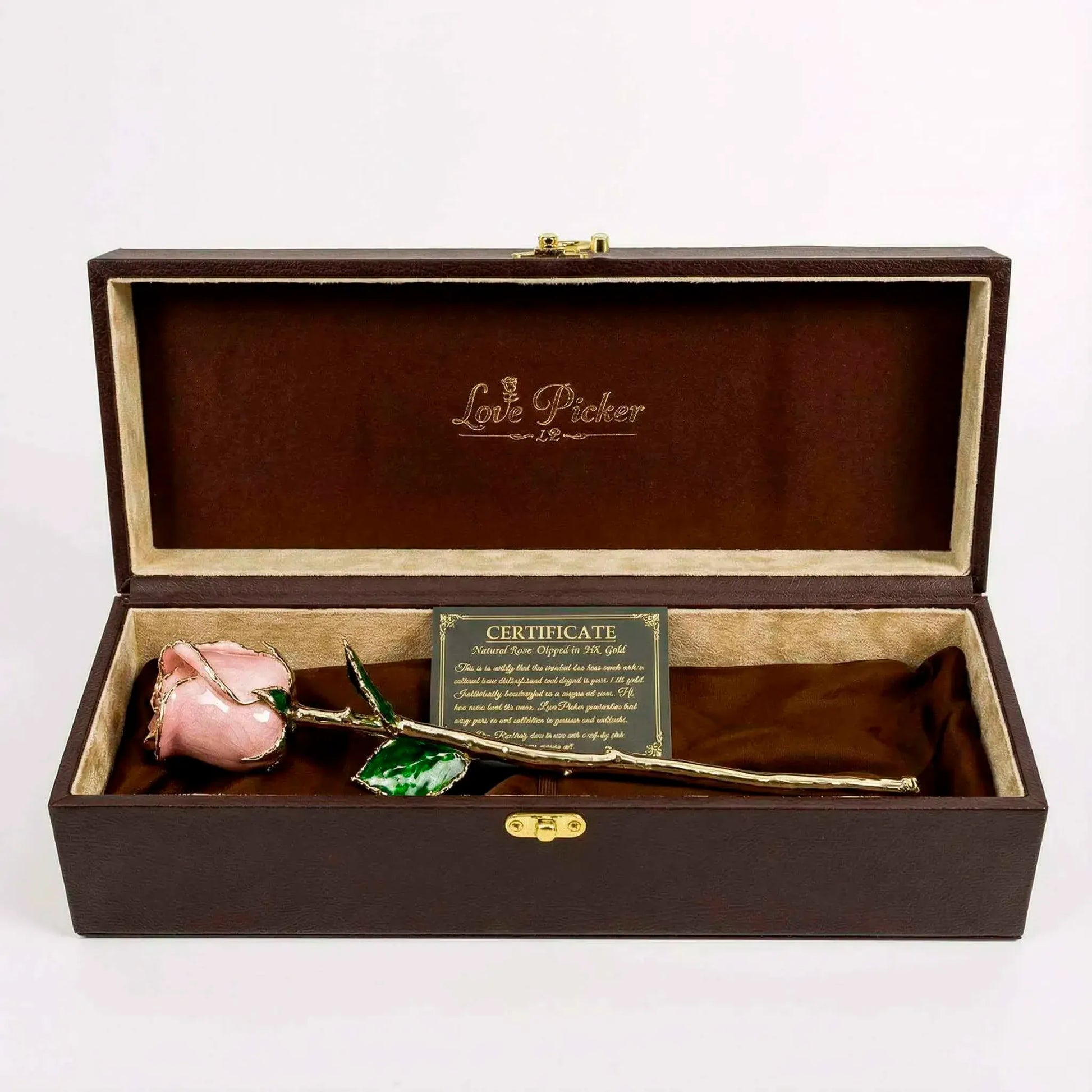 Gold-leafed rose in a decorative box with 'Love Fisher' branding on awhite background 