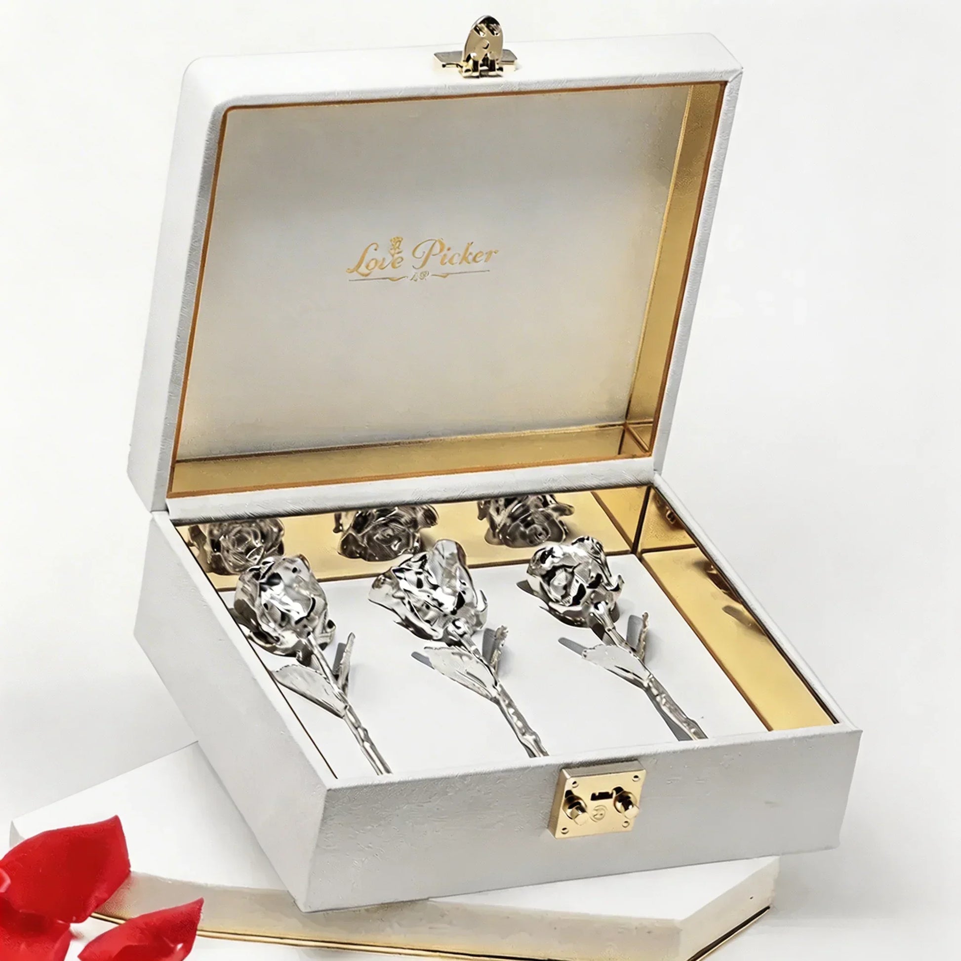 Silver preserved roses in elegant white and gold gift box, luxury romantic gift idea