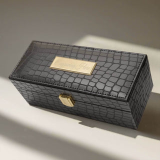 Black crocodile-patterned vegan leather gift box with gold accents on a light surface for gold dipped rose 