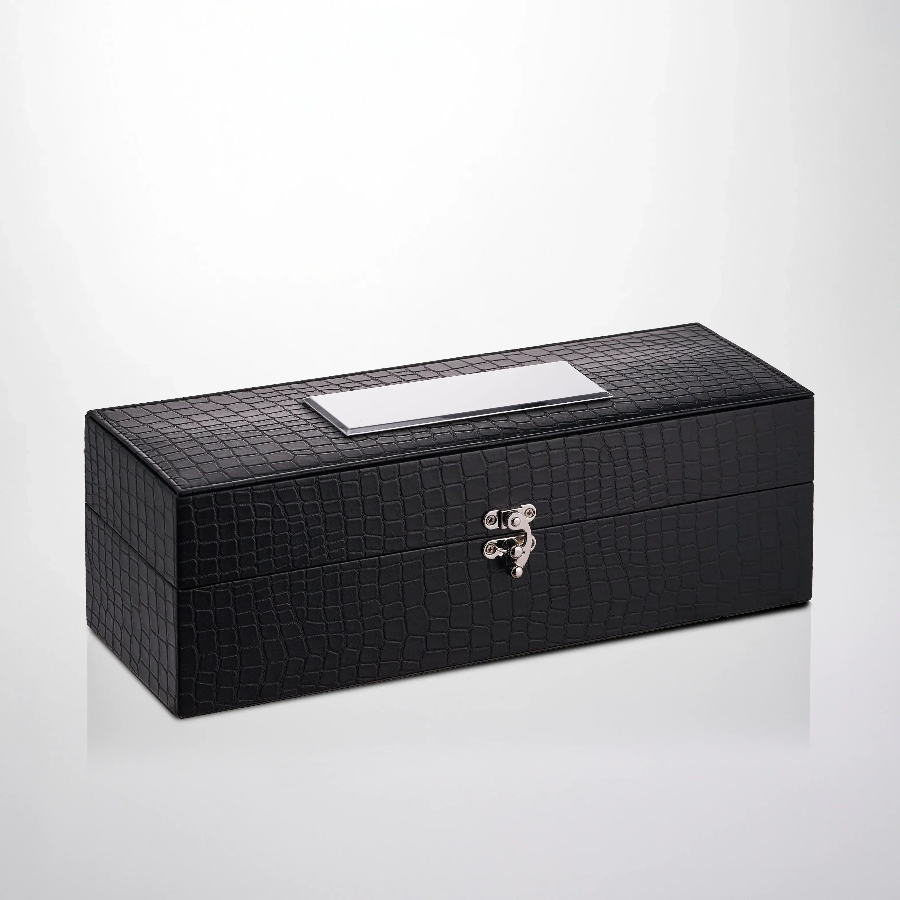 Black textured gift box with silver clasp and metal engraving plate, elegant packaging