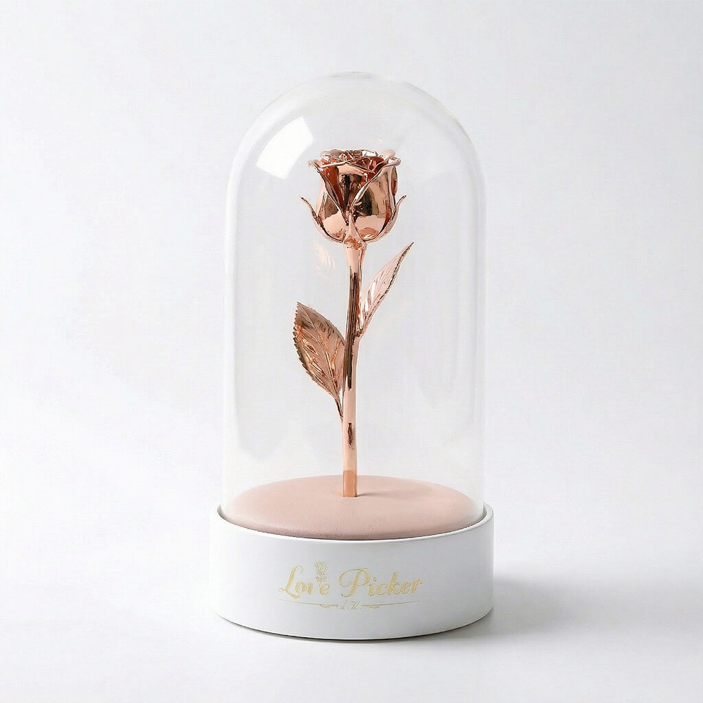 Rose gold rose inside a glass dome on a white base with 'Love Picker' branding.