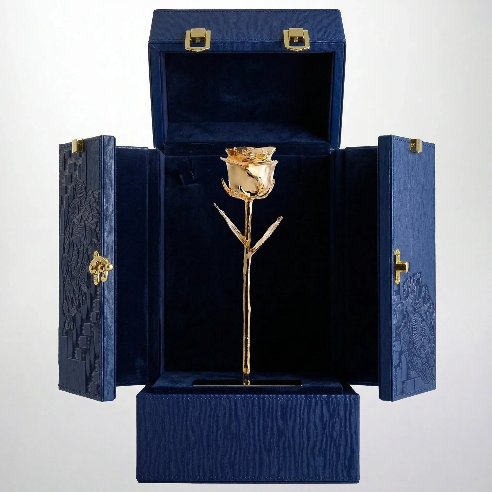 24K gold preserved rose displayed in an open blue luxury gift box