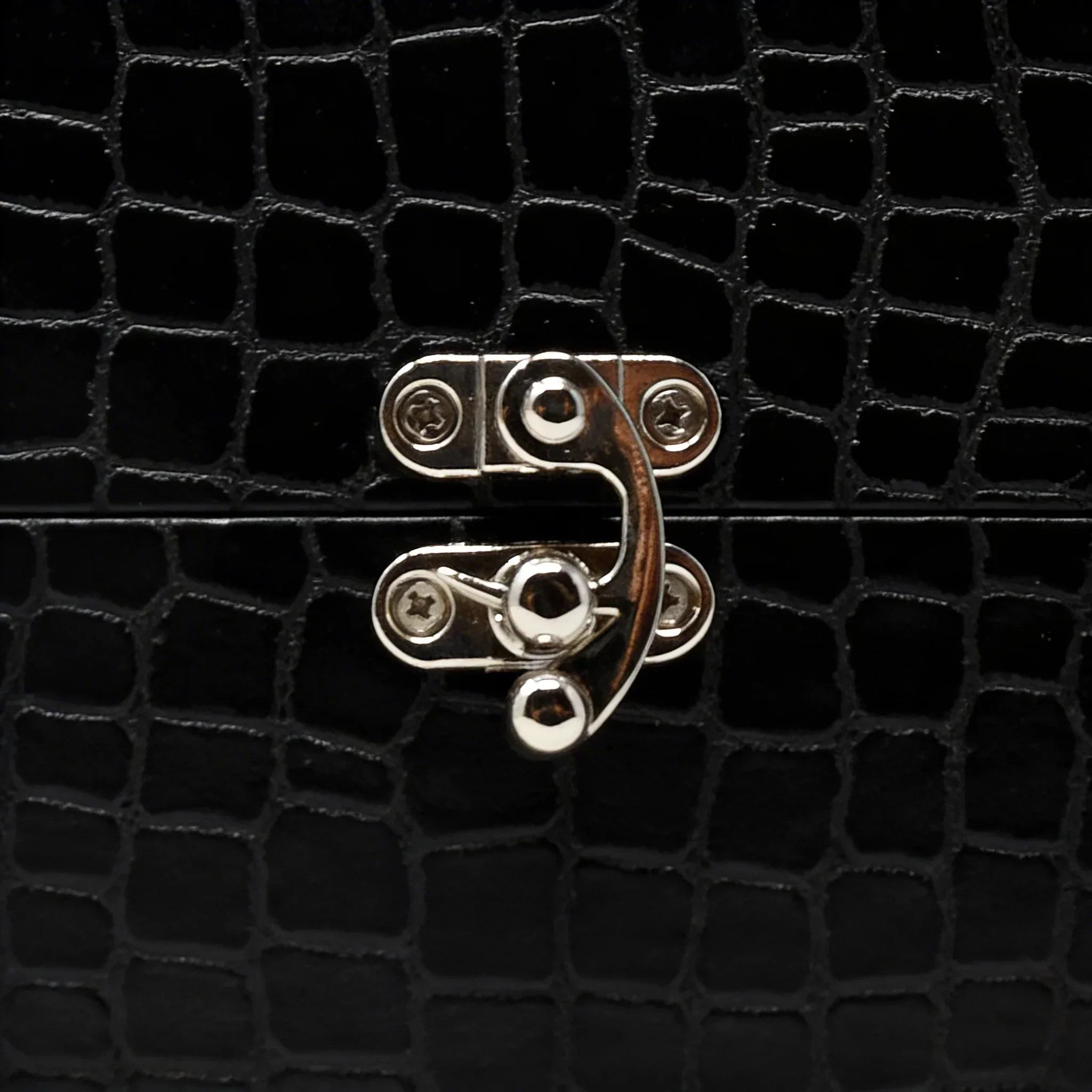 Black crocodile-texture gift box with a silver clasp, luxury floral packaging