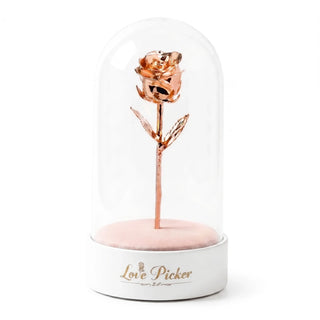 Rose gold rose inside a glass dome on a white base with 'Love Picker' branding.